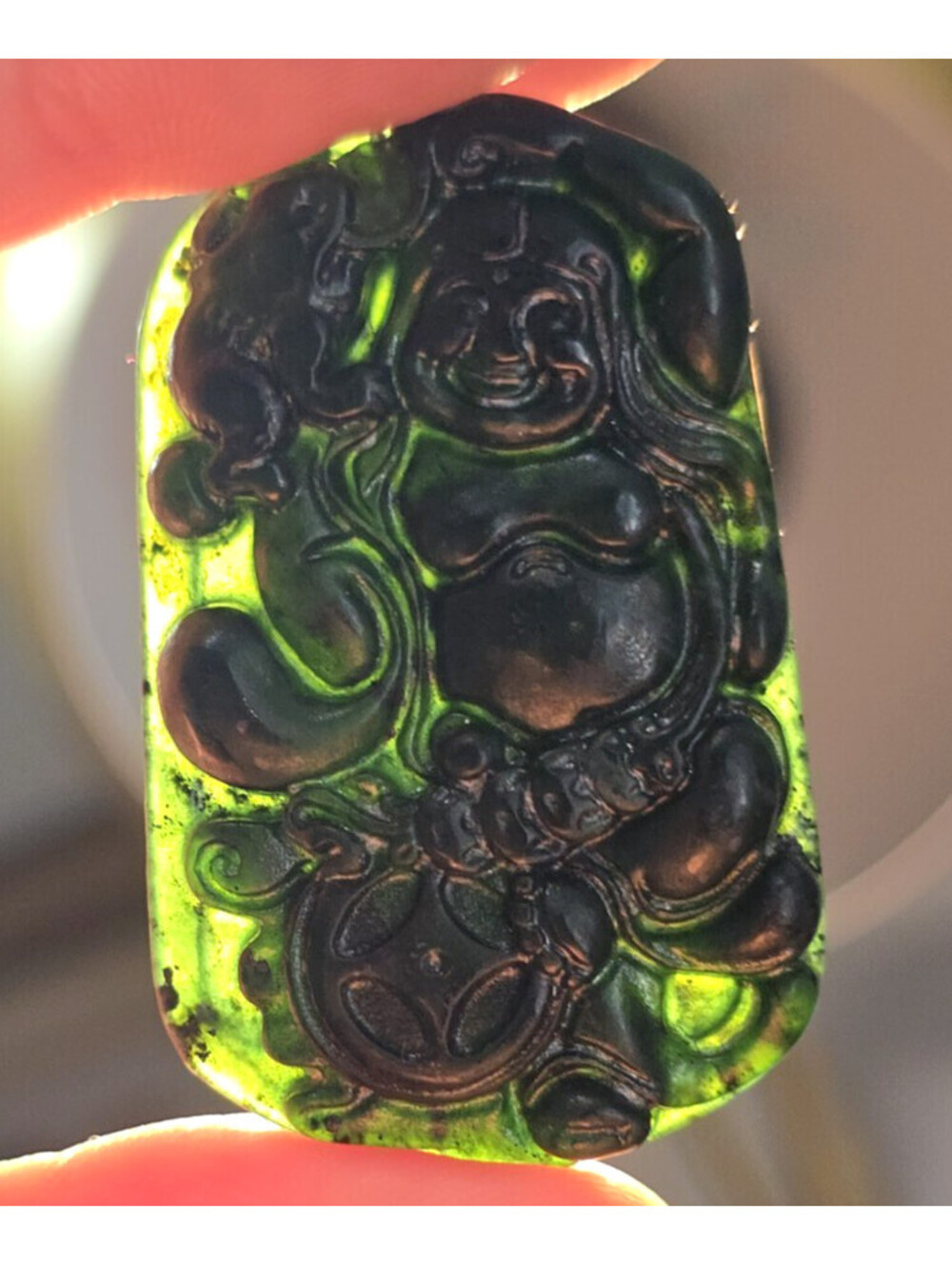 Highly Detailed Dark Green to Black Carved Serpentine Jade Buddha Pendant